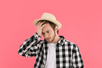 Wall Mural - Concept of people, young man on pink background