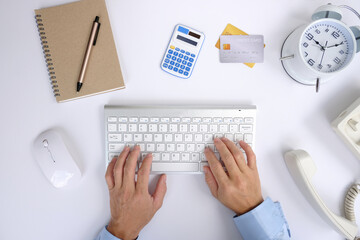 Poster - Man accountant using calculator and laptop computer in office, businessman working at home, finance and accounting concept.