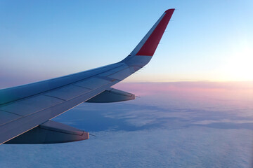 Wall Mural - wing of an airplane. travel tourism air transportation concept. selective focus