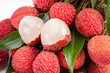 © MERCURY studio - Close up shot Fresh Lychee with leaves white background, Sweet lychees fruits with leaves on White