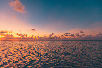 Poster - Calm sea with sunset sky and sun through the clouds over meditation ocean and sky background. Tranquil seascape. Horizon over the water, peaceful relaxation nature. Ocean lagoon, horizon seaside