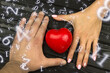 numerology, a girl's hand pulls a heart to a man's hand surrounded by numbers, the concept of love