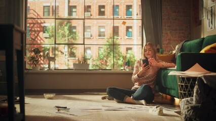 Aufkleber - Caucasian Woman Using Smartphone while Resting at Home. Female Blogger Creating Content and Scrolling the Feed Over the Internet. Using Social Networks Concept