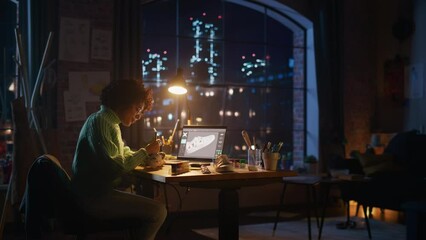 Poster - Creative Female Designer Applying Patterns on Shoe by Prototype of 3D Model at Laptop Screen. Stylish Studio with Night City View at the Window. Young Person Drawing and Creating New Things Concept
