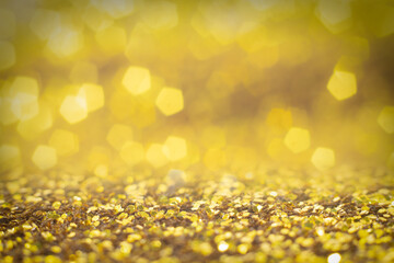 Wall Mural - gold glittering christmas lights. blurred abstract background