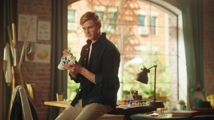 Aufkleber - Handsome Teenage Male Designer Standing and Drawing New Creative Sneakers at Home Living Room, Looking at Camera. Artist is Customising Hype Shoes by Adding Own Design. Fashion Project Concept