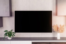 Large Contemporary Tv Set With Blank Black Lcd Screen Hanging On Wall In Home Interior