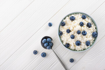 Wall Mural - Fresh cottage cheese with blueberries