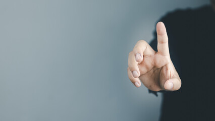 Wall Mural -  man's hand concept The man is spreading his hands at the level of his chest. Suitable for making products, products or symbols to put together with pictures.