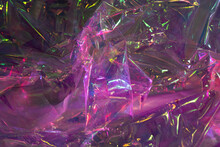 Crumpled Cellophane. Closeup Texture Of Bright Violet Pink Plastic Garbage Bag. Purple Polyethylene Film Background. 