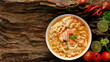 instant noodles with shrimp on wooden background