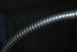 © TK_Office - Old lamp headband, metal, spiral, on a dark background