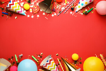 Wall Mural - Beautiful flat lay composition with festive items on red background, space for text. Surprise party concept