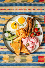 Wall Mural - .Download Preview.Share.Add to Likebox.Fried breakfast with bacon, sausages and baked beans