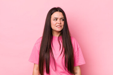 Wall Mural - young adult woman looking worried, stressed, anxious and scared, panicking and clenching teeth