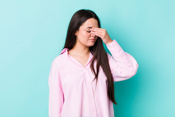 Poster - young adult woman feeling stressed, unhappy and frustrated, touching forehead and suffering migraine of severe headache