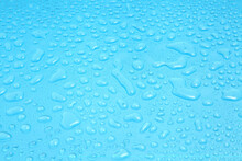 Close Up Water Drops On Blue Background, Water Drop In Macro Photography
