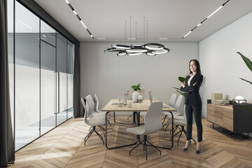 Canvas Print - Attractive thoughtful young european businesswoman standing in modern meeting room interior with window and city view, furniture. CEO and worker concept.