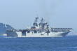 United States Navy amphibious assault ship USS Tripoli sailing in Tokyo Bay.
