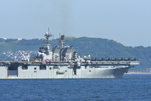 United States Navy Amphibious Assault Ship USS Tripoli Sailing In Tokyo Bay.