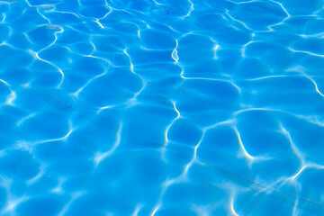  Texture of water in swimming pool for background. Surface of blue swimming pool
