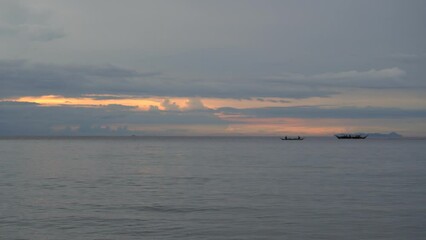 Wall Mural - Traveling home late afternoon with wet season clouds building Oriental Mindoro the Philippines