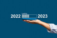 Countdown To 2023 Concept. The Virtual Download Bar With Loading Progress Bar For New Year's Eve And Changing The Year 2022 To 2023