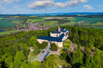 Top view of medieval castle Zbiroh. Czech Republic. Picturesque landscape with imposing medieval Zbiroh Castle in Rokycany district, Pilsen Region, Czechia.