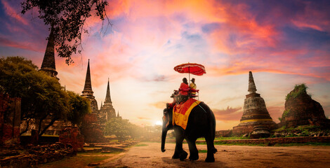 the tourists on an ride elephant tour of 