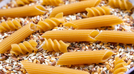 pasta from durum wheat of the second grade and seeds of sesame, flax, chia. Food containing carbohydrates, fats, trace elements and protein.