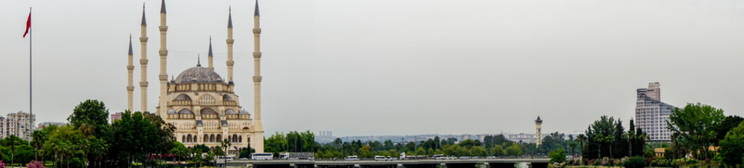 14 May 2022 Adana Turkey. Sabanci mosque and Seyhan river on a cloudy day