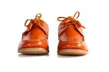 Men fashion orange leather boat shoes with shoe tree (shape supporter)  isolated on white background. clipping path, front view