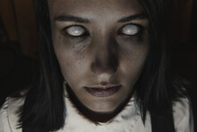 Female Zombie Staring Into Camera, Close-up Portrait