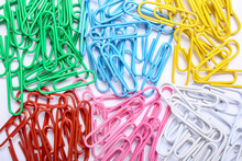 Colorful Paper Clips On White Background, Top View