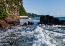 Beautiful Views Of The Coast Of The Island Of Sao Tome And Prince. High Waves Crashing Against The Rocks.