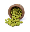 Pile of wasabi coated peanuts in a bowl isolated on white.