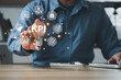 The man is holding light bulb. Key Performance Indicator (KPI) using Business Intelligence (BI) metrics to measure achievement versus planned target, person touching screen icon, success.