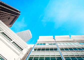 Wall Mural - Low angle modern architecture with blue sky. 3D Rendering.