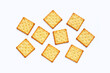Dry cracker cookies on white background.