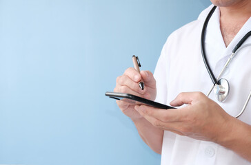 Poster - Doctor using mobile smartphone, Medicine doctor with stethoscope.