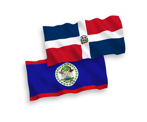 National vector fabric wave flags of Dominican Republic and Belize isolated on white background. 1 to 2 proportion.