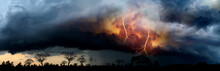 Panorama Dark Cloud At  Night With Colorful Spark  Thunder Bolt. Heavy Storm Bringing Thunder, Lightnings And Rain In Summer.