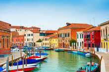 Colorful Houses On The Canal In Murano Island, Venice, Italy. Famous Travel Destination.