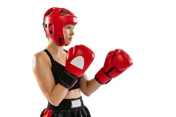 Wall Mural - Portrait of professional female boxer in sports protective equipment posing isolated on white studio background. Sport, competition, hobby, results, success concept