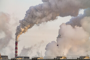 Wall Mural - industrial chimneys with heavy white smoke causing air pollution problem	