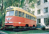 Fototapeta Londyn - old red retro tram in the museum under the sky photo taken on 35 mm film