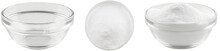 Soda In A Glass Bowl. Soda, Flour, Salt Or Sugar In A Glass Container. Two Angles Of A Plate With White Powder And An Empty Plate On A White Background.