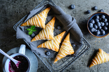Wall Mural - Blueberry puff pastry Turnovers with lemon glaze
