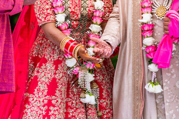 Indian Hindu wedding ceremony rituals bride and groom's hands close up