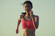 © Austockphoto - Fit Asian woman running for morning exercise